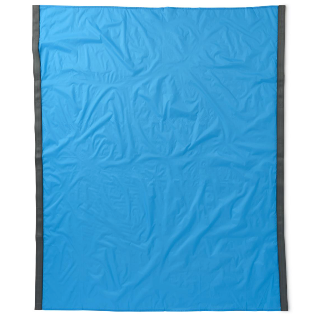 The Medline Transfer Sheet for Bariatric Patients is a large rectangular blue fabric with black edging on the sides, made from friction-reducing material to assist with lateral transfers. Slight wrinkles are visible as it lies flat.